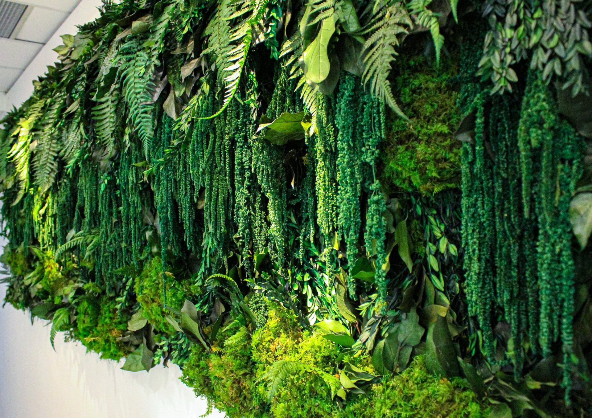 Artificial greenery and moss wall in a commercial space