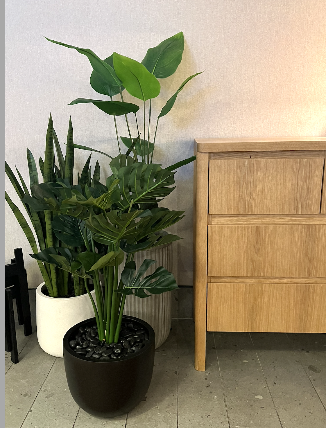 Artificial plants in decorative planters by Greenscape Design adorn Moxies Georgia restaurant in Vancouver.