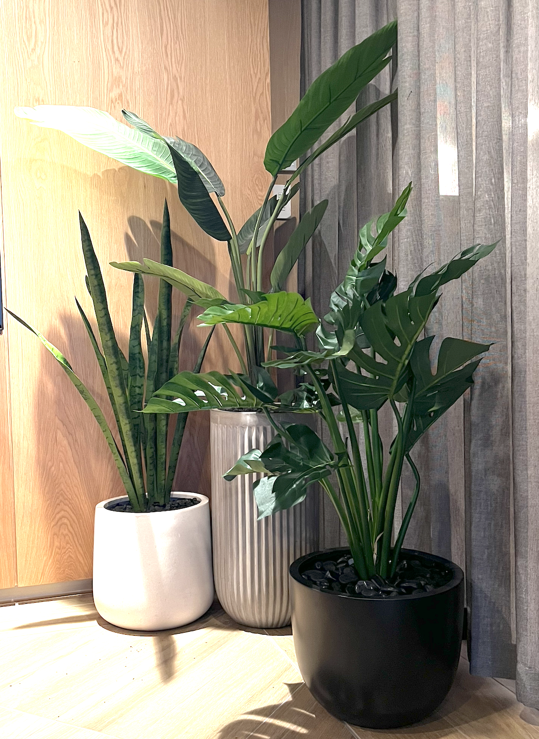 Commercial artificial plants by Greenscape Design adorn a restaurant interior in Vancouver.