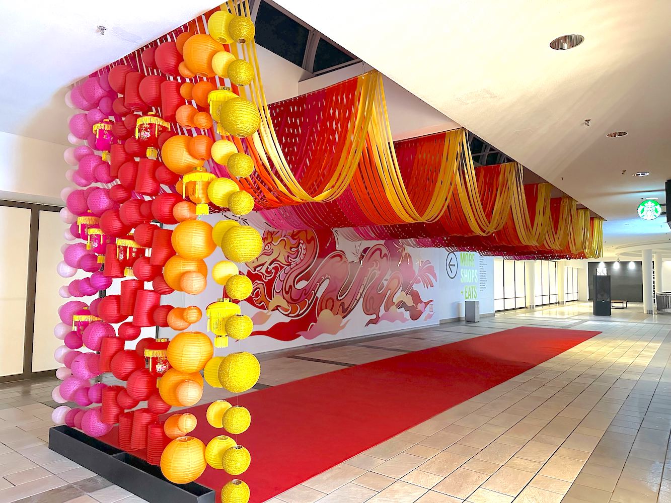 Bright and colorful custom ribbon and lantern Lunar New Year display by Greenscape Design in Vancouver.