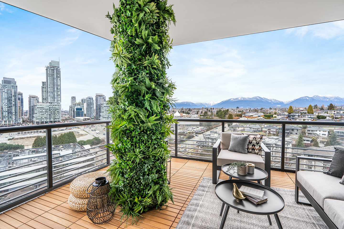 Artificial greenery wrapped around a column on a high rise residential balcony