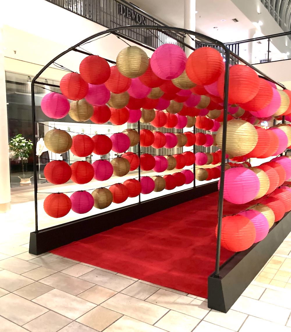 Greenscape Design's Lunar New Year Walk Through Lantern Tunnel at The City of Lougheed Town Centre, featuring vibrant illuminated lanterns creating a captivating pathway.