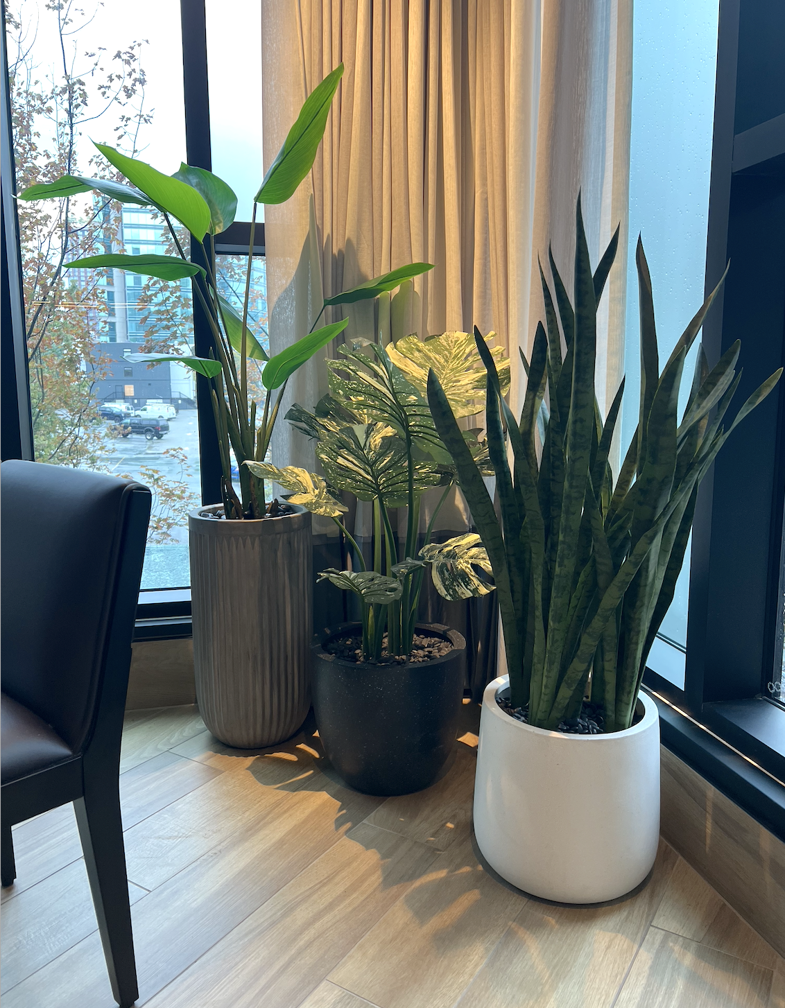 Artificial greenery planters by Greenscape Design at Moxie's Restaurant in Vancouver.
