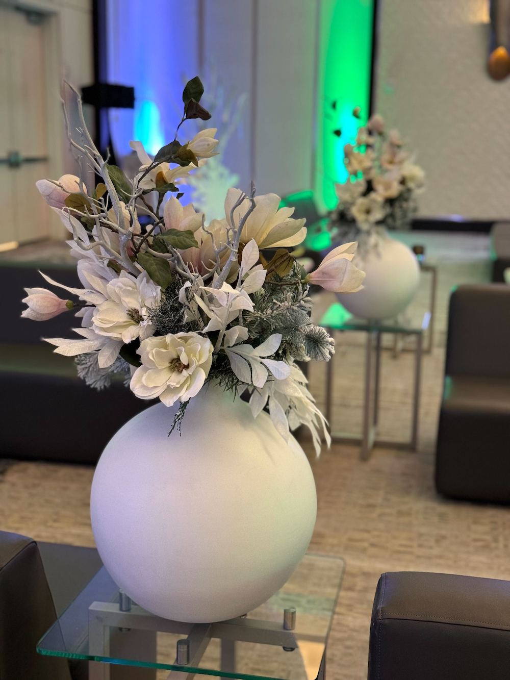 Winter Wonderland Floral Arrangement with magnolias by Greenscape Design