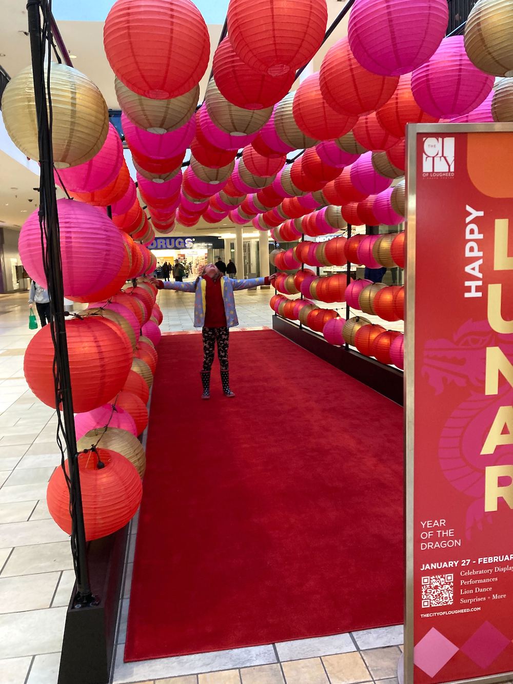 Greenscape Design's Year of the Dragon Illuminated Lantern Tunnel at Vancouver's Lunar New Year Display, featuring vibrant lanterns lighting up the pathway.