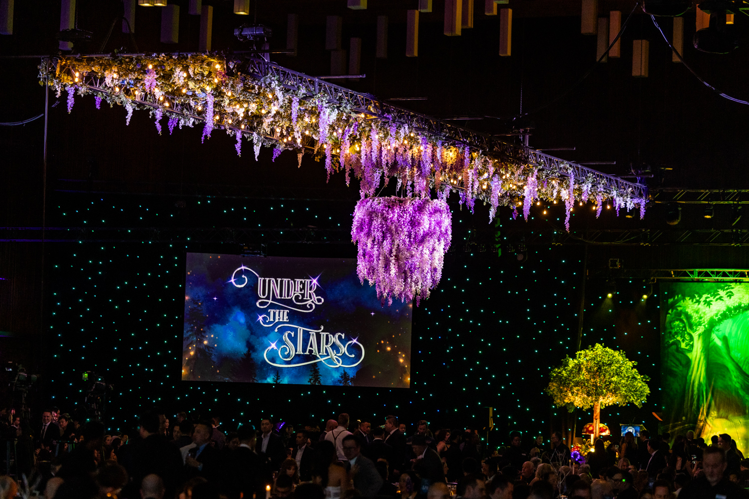 Medallion Gala 2024 purple and white wisteria floral chandelier custom event décor by Greenscape Design in Vancouver.