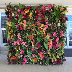 Colourful mixed floral backdrop for event rentals