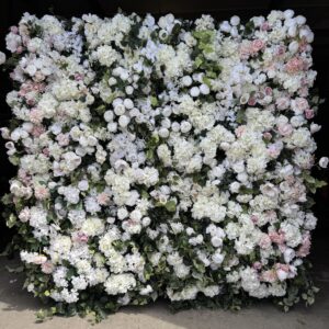 Artificial floral wall featuring lush white and soft blush pink flowers with greenery, created by Greenscape Design.