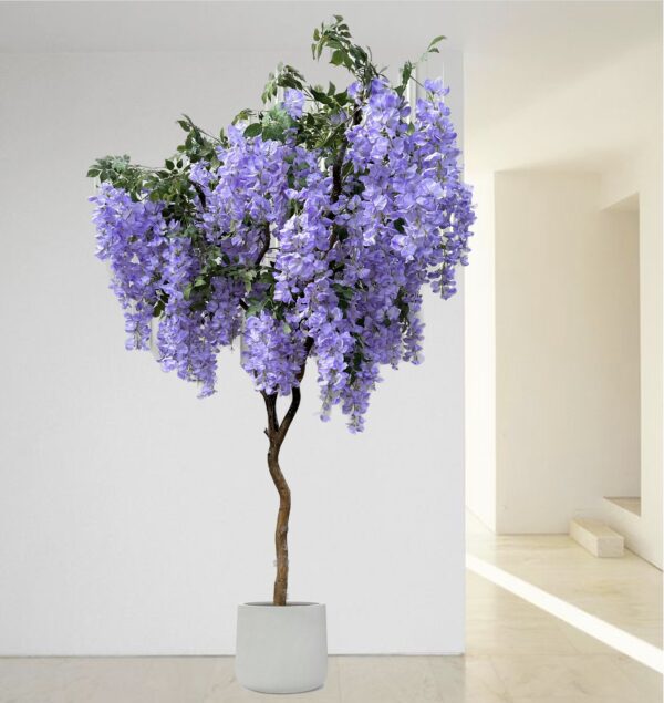 Artificial purple wisteria tree in a white planter with cascading blossoms.