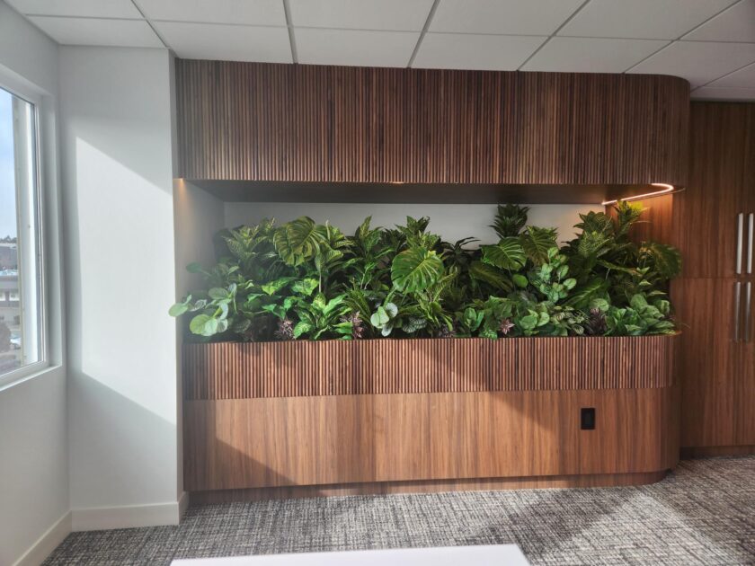 artificial plants in an office corner