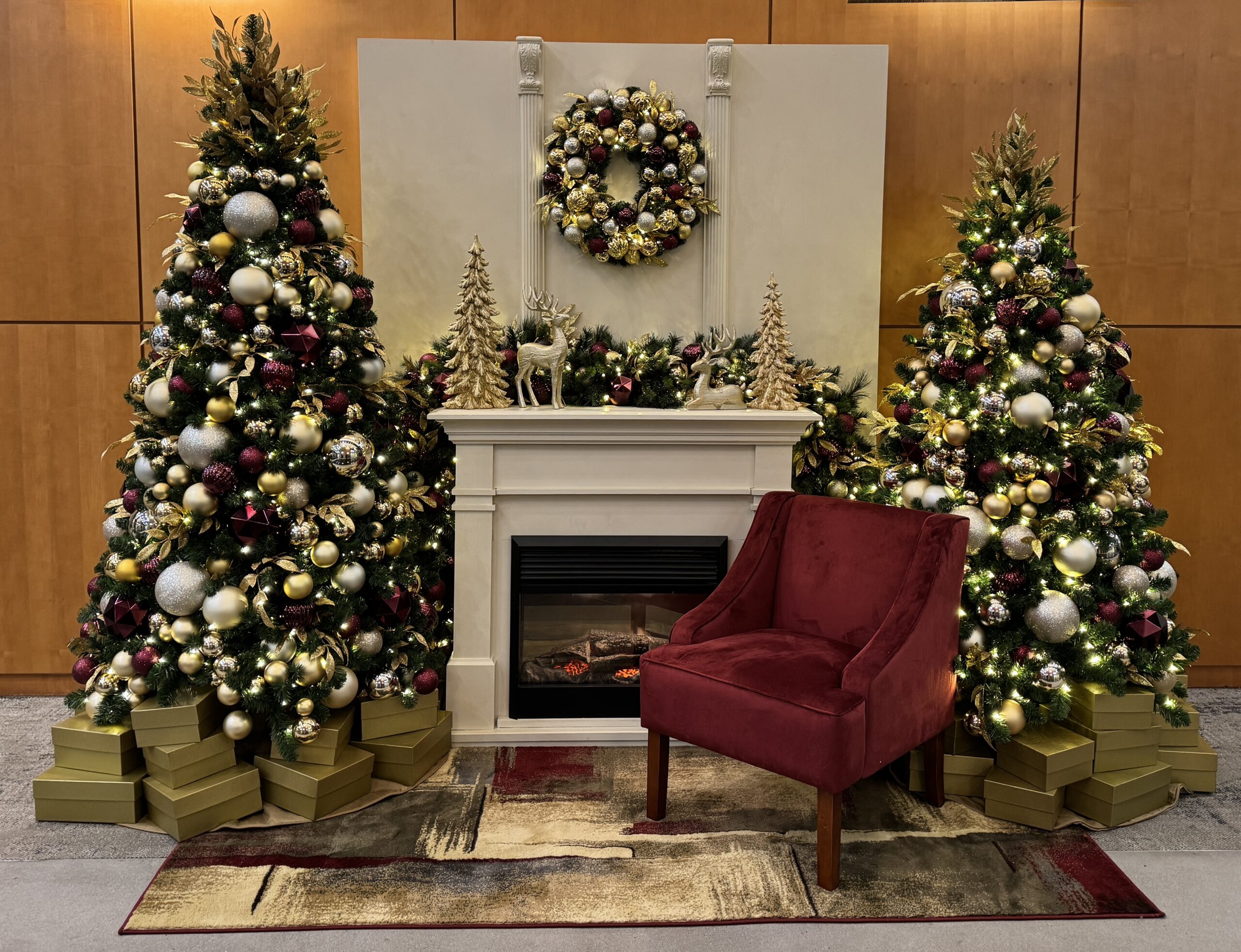 Corporate lobby mantle decorated for Christmas photo backdrop