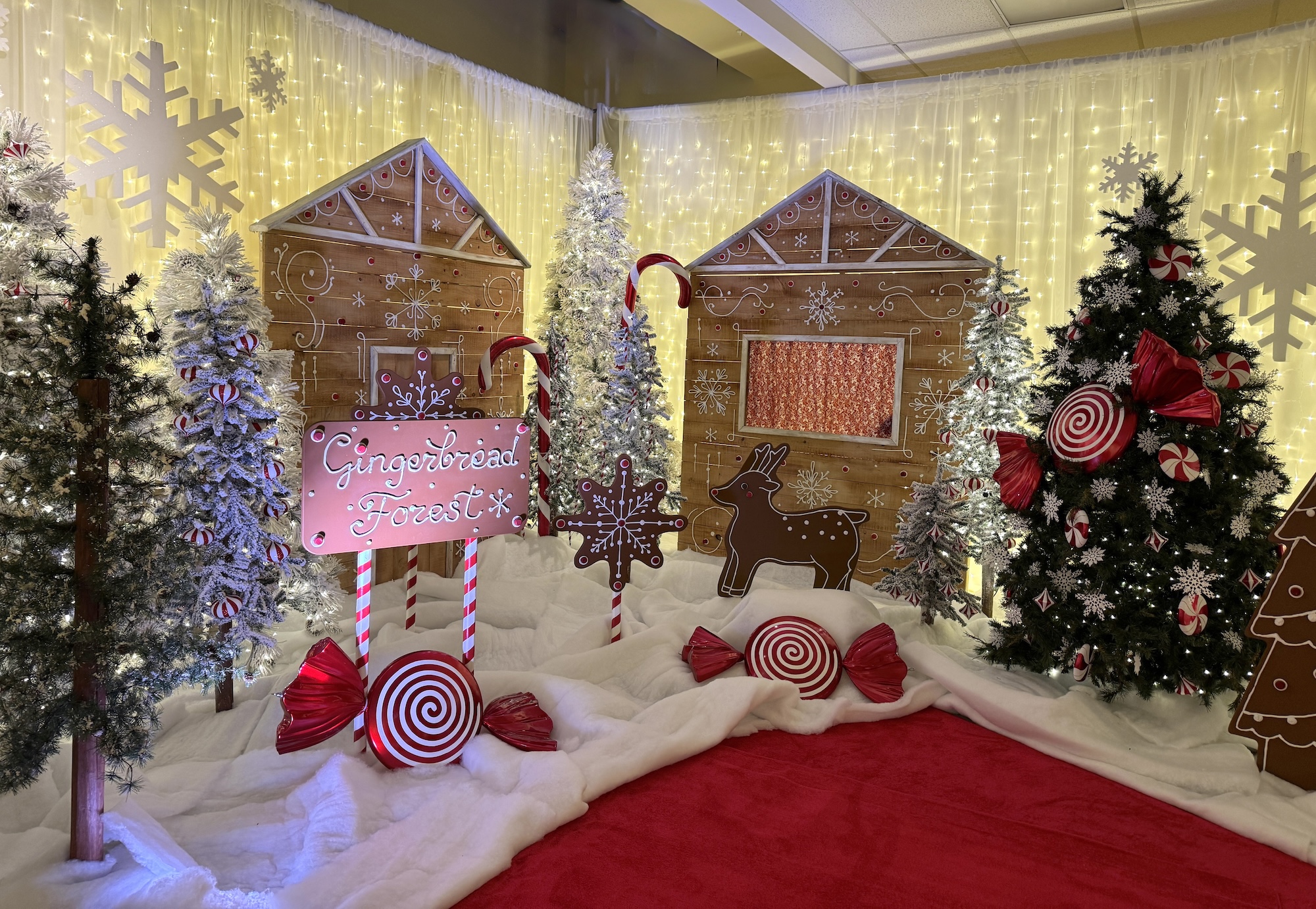 Gingerbread house Christmas display with candy props in mall