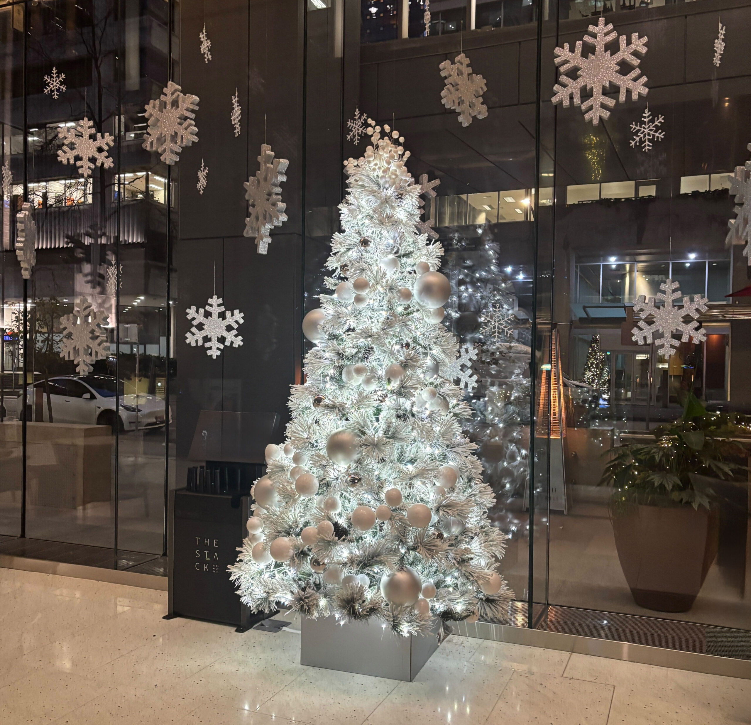 White Christmas tree in corporate office lobby