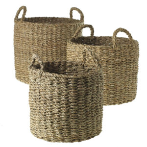 Set of natural woven baskets with handles used as decorative containers for event styling and greenery displays.