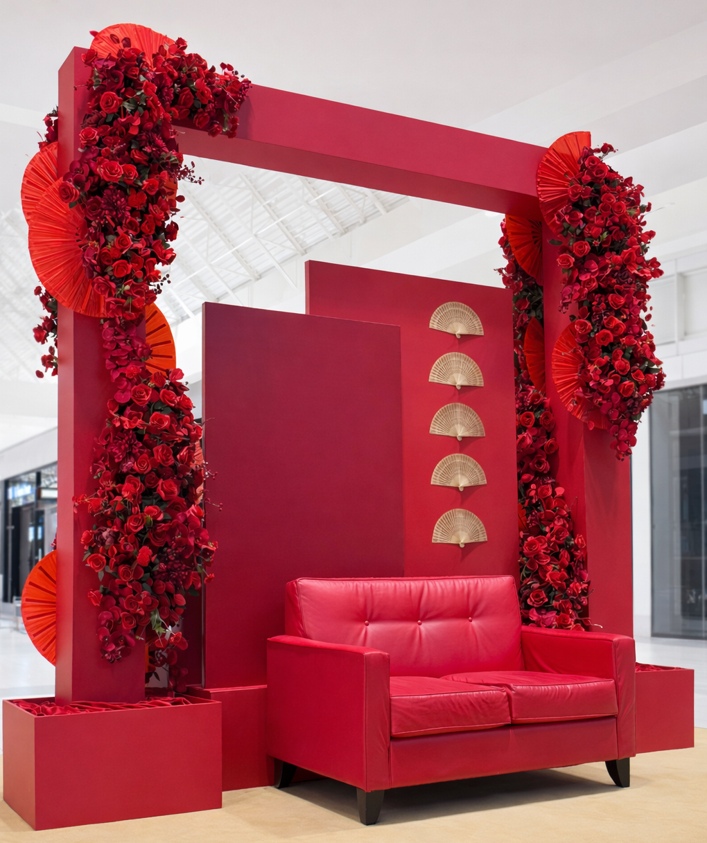 Red rose display with fan accents in mall photo backdrop