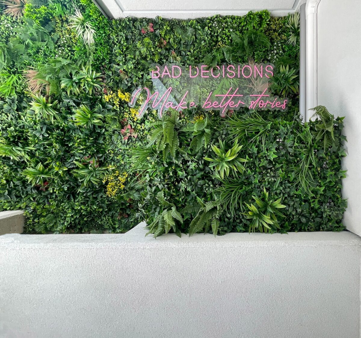 commercial greenery wall neon sign entrance decor